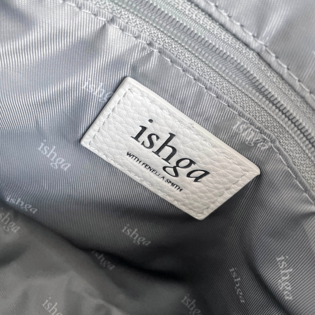 ishga label on inside of vegan leather wash bag