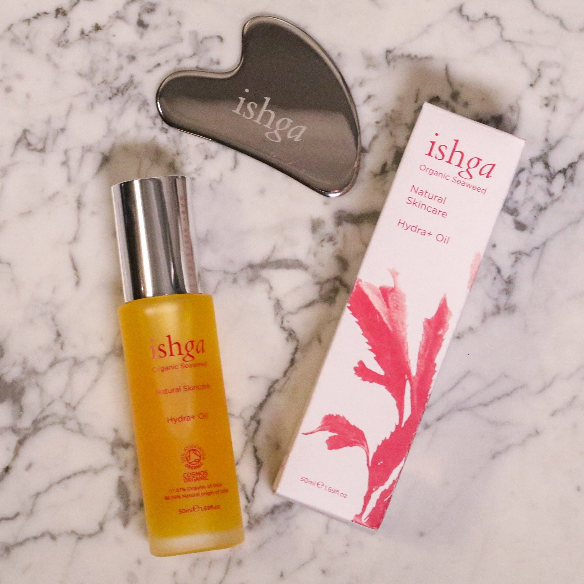 Hydra+ Oil and gua sha on marble worktop