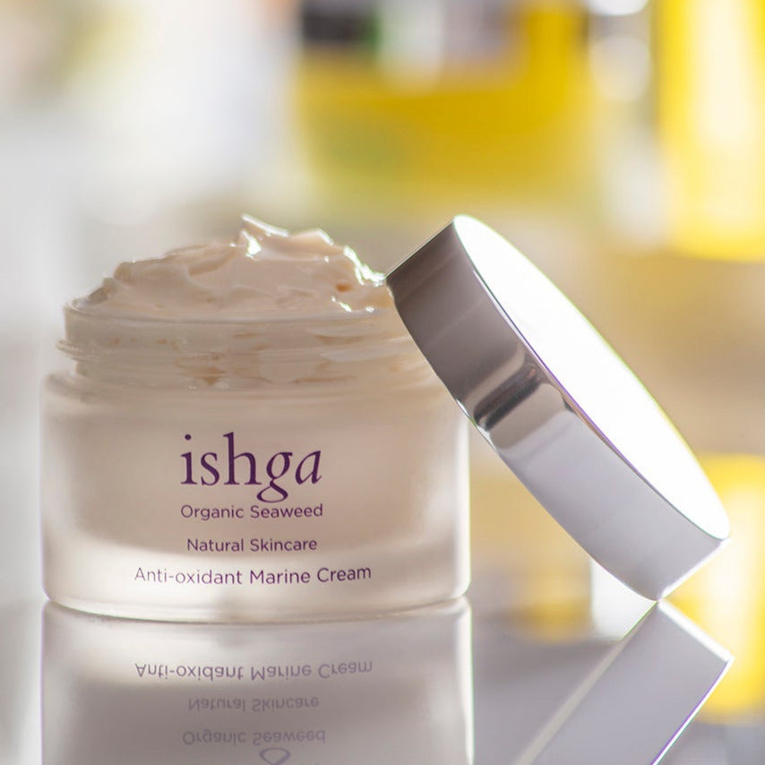 Award winning ishga Anti-oxidant Marine Cream open with lid next to it