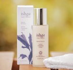 Bottle of ishga Active Cleansing Lotion next to its box and a white towel