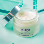 Opened jar of ishga Anti-oxidant Marine Cream with its lid next to it