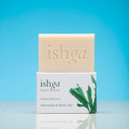 Bar of ishga Shampoo & Body Bar sitting on top of its box