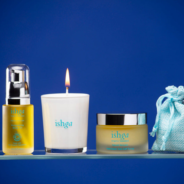 ishga Spa at Home Body Set which includes Hebridean  Candle, Hebridean Sea Salt Scrub, glass bottle of Invigorating Body Oil and a small pouch of  Invigorating Bath Salts
