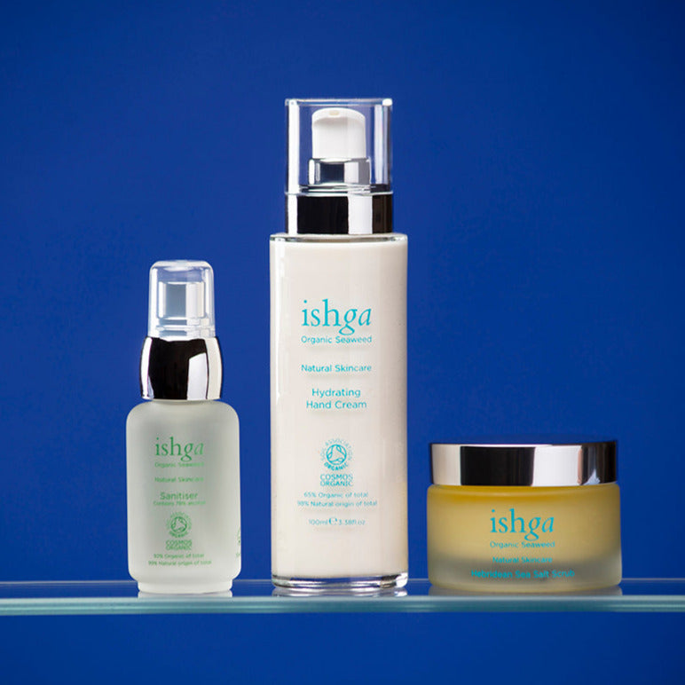 A bottle of ishga Sanitiser, a bottle of Hydrating Hand Cream and a jar of Hebridean Sea Salt Scrub