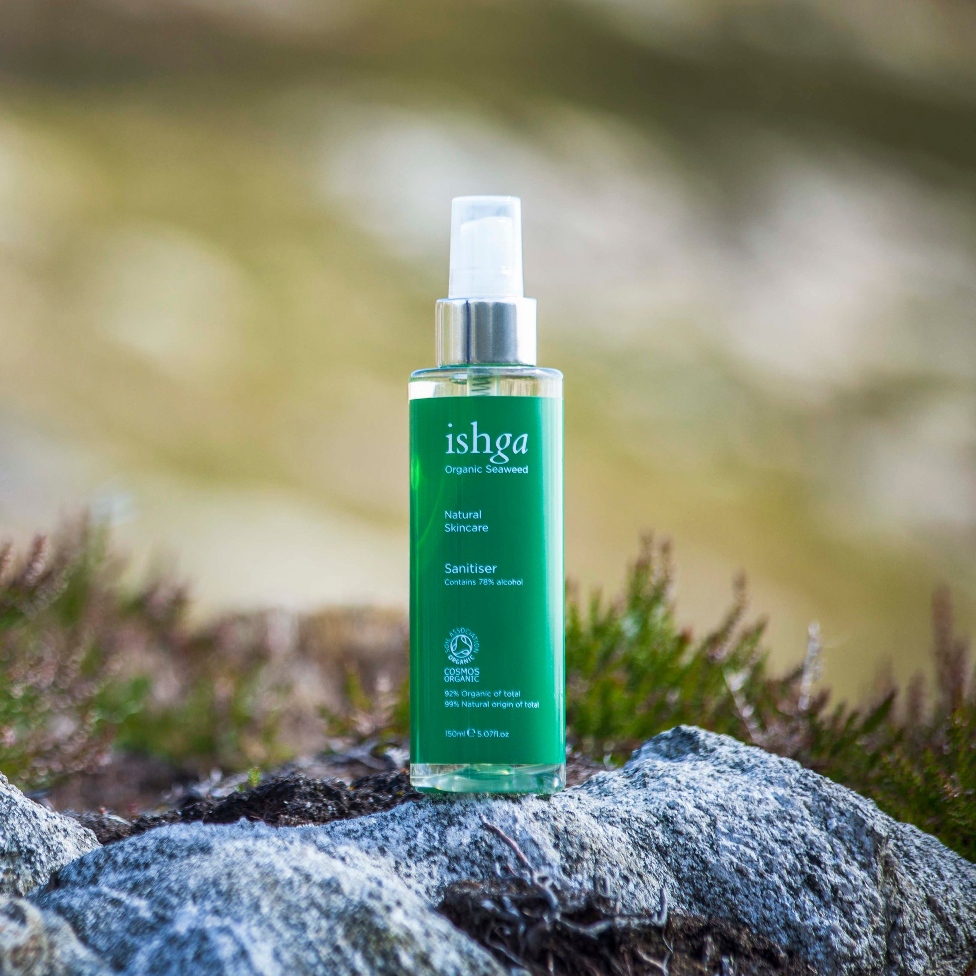 Bottle of award winning ishga Hand Sanitiser on a rock