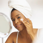 Lady rubs some ishga Anti-oxidant Marine cream into her face